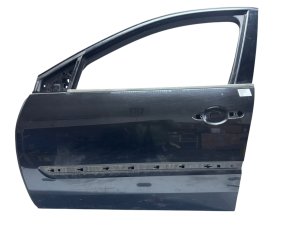 Puerta delantera izquierda Renault Laguna III 801010025R  Lak NV676 Original usada